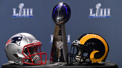Jan 30, 2019; Atlanta, GA, USA; The Vince Lombardi Trophy and helmets for the New England Patriots and Los Angeles Rams are displayed before the Roger Goodell press conference in advance of Super Bowl LIII at Georgia World Congress Center.