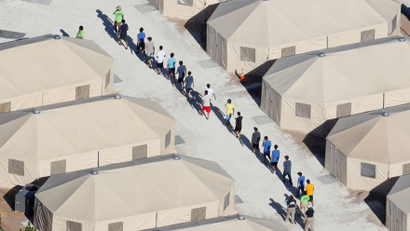 Immigrant children housed in a tent encampment under Trumps "zero tolerance" policy