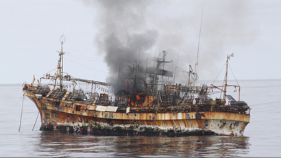 Japanese fishing vessel, "Ryou-Un Maru", shows significant signs of damage after U.S. Coast Guard Cutter Anancapa fired explosive ammunition into it, 180 miles (about 290 km) west of the Southeast Alaskan coast April 5, 2012. The U.S. Coast Guard opened fire on Thursday on a derelict Japanese fishing vessel washed out to sea by last year's devastating tsunami in a bid to sink it and eliminate a threat to navigation, a spokesman for the agency said. REUTERS/U.S. Coast Guard/Handout