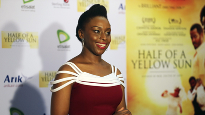 Nigerian novelist Chimamanda Ngozi Adichie arrives for the premier of film "Half of a Yellow Sun", an adaptation of her book, in Lagos April 12, 2014.