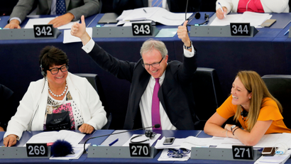 Rapporteur on copyright MEP Axel Voss celebrates after a vote on modifications to EU copyright reforms.