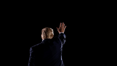U.S. President Donald Trump waves as he leaves after his campaign rally at Middle Georgia Regional Airport in Macon, Georgia, U.S., October 16, 2020.