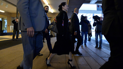 Meng Wanzhou walks out of court wearing an ankle monitor