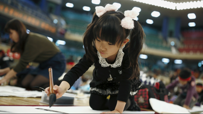 Girl doing calligraphy