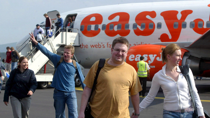 Passengers disembark from low-cost airline easyJet's plane.