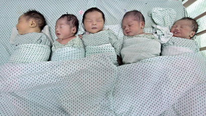 Four babies asleep.