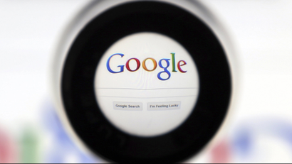 google logo under magnifying glass