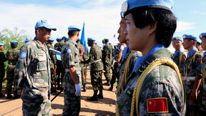 Chinese Peacekeepers in the United Nations Mission to South Sudan (UNMISS) parade during the International Day of United Nations Peacekeepers in Juba, South Sudan May 29, 2017.