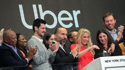 Uber executives cheer at the company's May 10 IPO.
