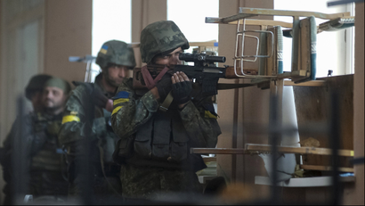 Ukrainian servicemen are seen at their position during fighting with pro-Russian separatists in the eastern Ukrainian town of Ilovaysk August 26, 2014.