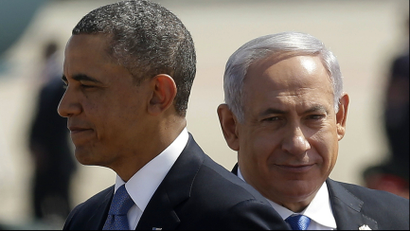President Barack Obama, left, with Israeli Prime Minister Benjamin Netanyahu, right, during his arrival ceremony at Ben Gurion International Airport in Tel Aviv, Israel, Wednesday, March 20, 2013.