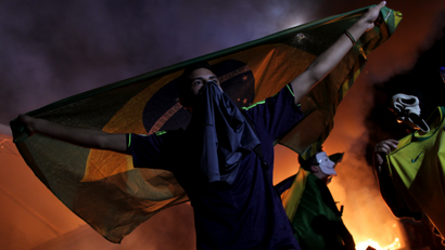Brazil protester with flag