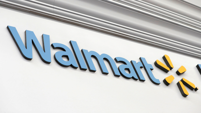 A Walmart sign on the side of one of its stores