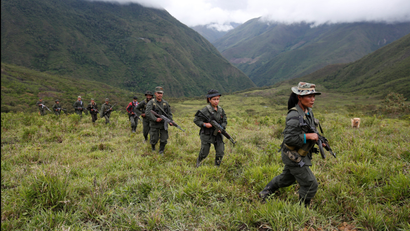 Members of the FARC patrol in the remote mountains of Colombia.