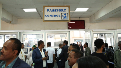 Passengers wait to be processed at the immigration section after arriving at the Asmara International Airport aboard an Ethiopian Airlines flight in Asmara, Eritrea July 18, 2018.