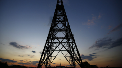 Gliwice radio tower, Europe's tallest wooden structure, is pictured after sunset at Gliwice radio station in Upper Silesia, southern Poland, August 28, 2014. As Poles and Germans prepare to mark the 75th anniversary on Monday of Hitler's invasion of Poland, historians and residents of Gliwice recalled the seizure of the radio station - still today Europe's tallest wooden structure - and drew parallels with the role of media in modern conflicts such as Ukraine. Picture taken on August 28, 2014. REUTERS/Kacper Pempel (POLAND - Tags: CONFLICT ANNIVERSARY) - GM1EA8U04TF01