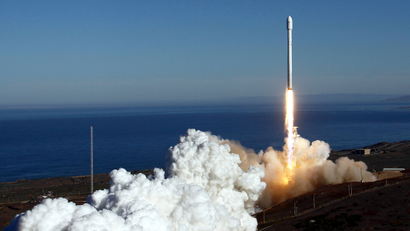 A Falcon 9 rocket carrying a small science satellite for Canada is seen as it is launched from a newly refurbished launch pad in Vandenberg Air Force Station September 29, 2013. The unmanned rocket blasted off from California on Sunday to test upgrades needed for planned commercial launch services. The 22-story rocket, built and flown by Space Exploration Technologies, or SpaceX, soared off a newly refurbished, leased launch pad at Vandenberg Air Force Station at noon EDT/1600 GMT (05.00 p.m. British time).