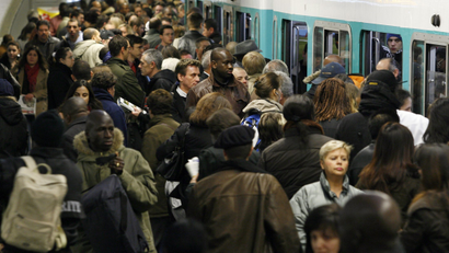 A crowded subway entrance in Paris.