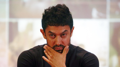 Bollywood actor Aamir Khan attends a news conference after an event to launch him as a United Nations Children's Fund (UNICEF) Regional Goodwill Ambassador for south Asia, in Kathmandu October 9, 2014. REUTERS/Navesh Chitrakar (NEPAL - Tags: ENTERTAINMENT POLITICS SOCIETY) - RTR49HYR