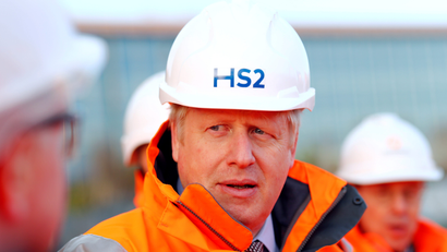 Boris Johnson wearing an HS2 hard hat