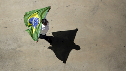 A demonstrator attends an August 2015 protest against Brazil's President Dilma Rousseff.