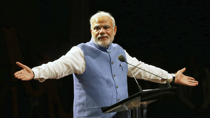India's Prime Minister Narendra Modi reacts as he speaks to members of the Australian-Indian community during a reception in Sydney November 17, 2014.