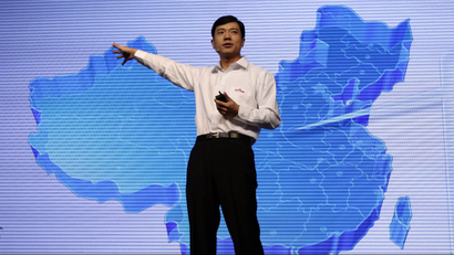 Robin Li, founder and chief executive of Chinese search engine Baidu, delivers a speech in front of a screen showing the map of China at the Baidu 2011 technology innovation conference in Beijing September 2, 2011. China's top search engine Baidu Inc launched a new mobile application system on Friday, seeking to bolster its presence in the mobile web as competitors including Alibaba Group increase their mobile offerings. REUTERS/Jason Lee