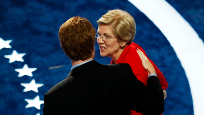 Representative Joseph P. Kennedy, III (D-MA) greets Senator Elizabeth Warren (D-MA) during the Democratic National Convention in Philadelphia, Pennsylvania, U.S. July 25, 2016.