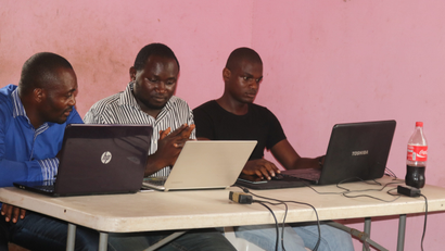 Young startup promoters work on their computers in New Bonako village, Cameroon March 28, 2017 2017. Picture taken March 28, 2017.