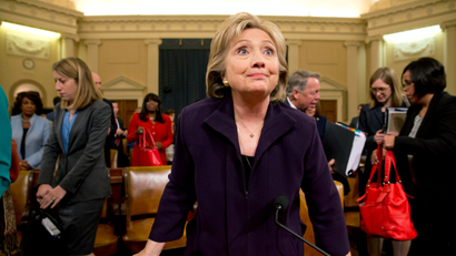 Democratic presidential candidate and former Secretary of State Hillary Rodham Clinton stands up at the end of testimony on Capitol Hill in Washington, Thursday, Oct. 22, 2015, before the House Select Committee on Benghazi.