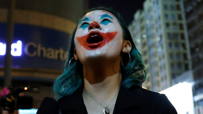 A protester in Hong Kong wearing Joker make up at a protest on Halloween.