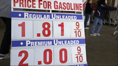 The price sign outside Costco in Westminster, Colorado, shows gas selling for $1.81.9 for the first time in years, December 23, 2014.