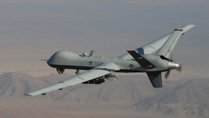 A MQ-9 Reaper, armed with GBU-12 Paveway II laser guided munitions and AGM-114 Hellfire missiles, piloted by Col. Lex Turner during a combat mission over southern Afghanistan.