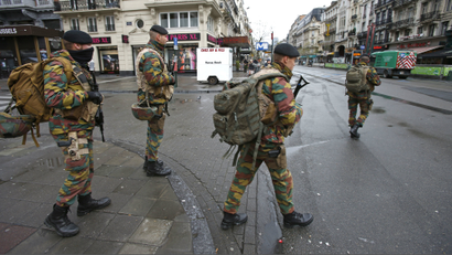 Belgian soldiers patrol in central Brussels, November 21, 2015, after security was tightened in Belgium following the fatal attacks in Paris. Belgium raised the alert status for its capital Brussels to the highest level on Saturday, shutting the metro and warning the public to avoid crowds because of a "serious and imminent" threat of an attack.