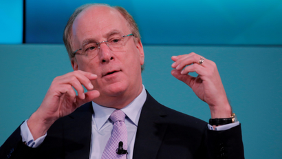 Larry Fink speaks at a conference in 2021