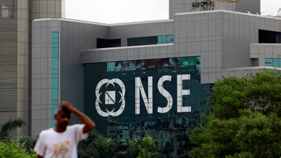 Man walks past the NSE (National Stock Exchange) building in Mumbai