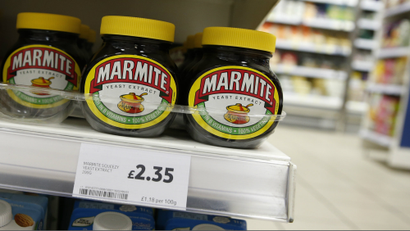Jars of savoury spread 'Marmite' which is owned by the Anglo-Dutch multinational Unilever, on sale in a branch of Tesco in central London.