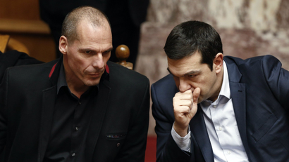 Greek Prime Minister Alexis Tsipras (R) and Finance Minister Yanis Varoufakis at the parliament in Athens.