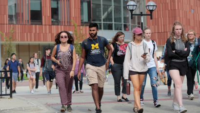 University of Michigan students walk on campus in Ann Arbor