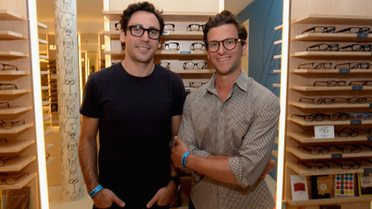 Warby Parker co-founders Neil Blumenthal (L) and Dave Gilboa attend Warby Parker's store opening in The Standard, Hollywood on August 15, 2013 in Los Angeles, California.