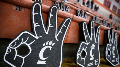 Cincinnati Basketball three-fingered foam hands