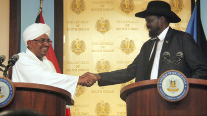 Sudan's Bashir, left, with South Sudan's Kiir, on a friendly day in April.