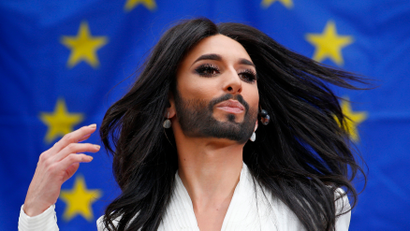 Conchita Wurst, the bearded transgender winner of the Eurovision Song Contest, performs during a concert at the European Parliament in Brussels October 8, 2014. The concert organised by members of Parliament aimed to support the adoption in February of the report against homophobia and sexual discriminations. REUTERS/Yves Herman (BELGIUM - Tags: POLITICS ENTERTAINMENT) - RTR49DJA