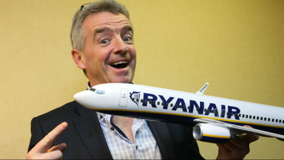 Michael O'Leary, CEO of Irish budget airline group Ryanair, poses for photographers during a news conference in Brussels.