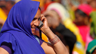 Rural Indian woman on the phone
