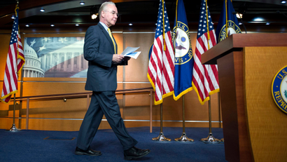 House Budget Committee Chairman Rep. Tom Price, R-Ga., walks to a podium to announce the House Republican budget proposal, Tuesday, March 17, 2015, on Capitol Hill in Washington. The plan includes a boost in defense spending but cuts in the Medicaid program for the poor, food stamps and health care subsidies.