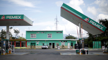The damaged roof of a Pemex gas station is seen in Casimiro, Mexico.