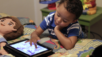 child-playing-with-an-ipad