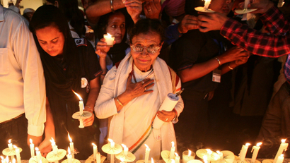 A 2018 photo of people in Amritsar, India, holding a candelight vigil to commemorate the Jallianwala Bagh massacre of 1919.