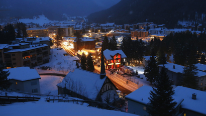 A view of Davos with the Congress Center in the early morning of the annual meeting of the World Economic Forum (WEF) 2014 in Davos January 24, 2014. The annual Davos gathering, which draws thousands of the world's most powerful people, will this year welcome more than 40 heads of state and government to focus on questions about the world's future, organisers said on Wednesday. This year's event will run from January 22 to 25.